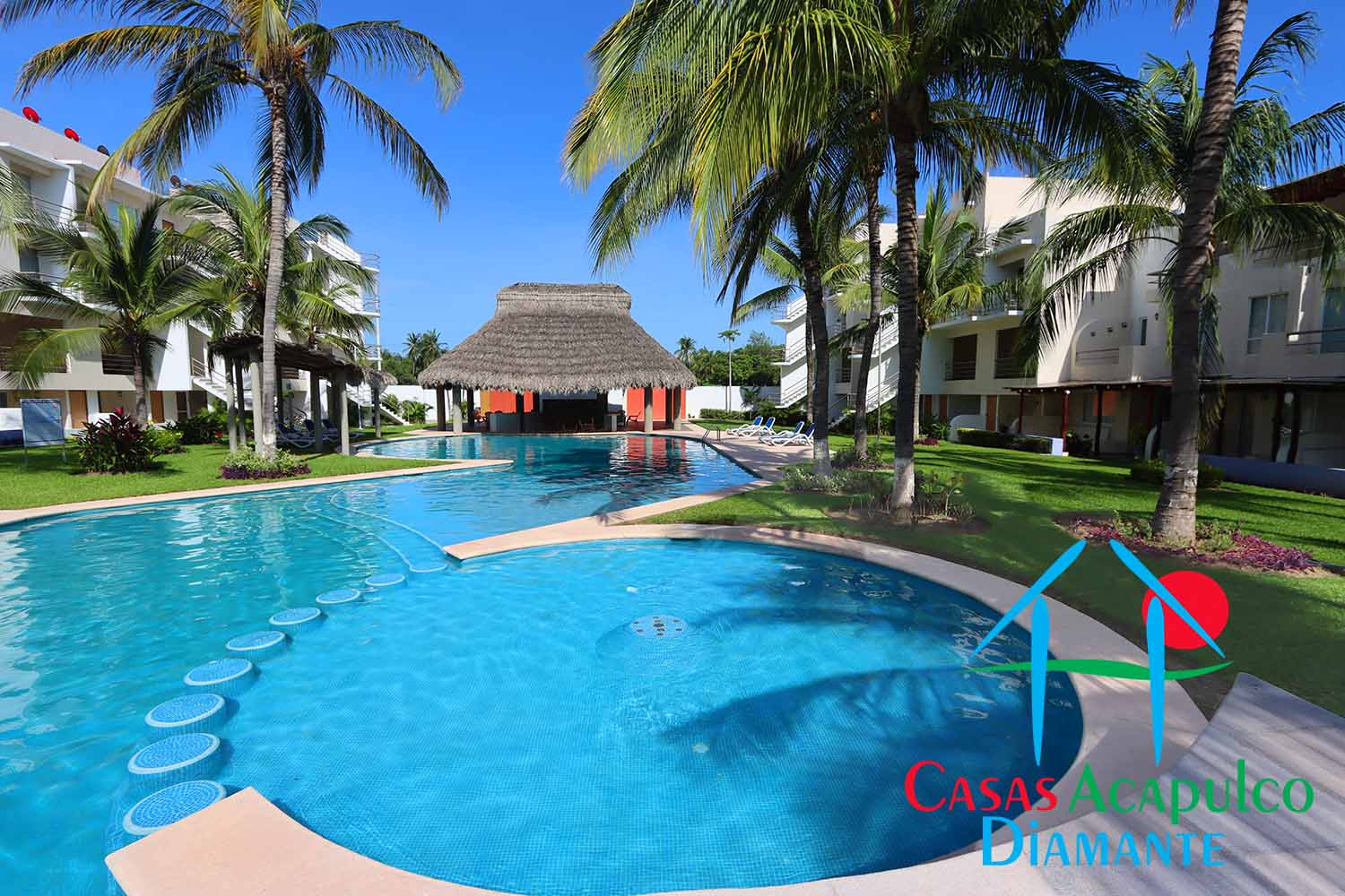Residencial Caracol - Albercas y jardines 9